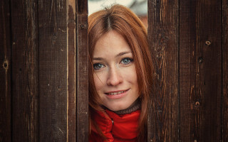 Woman redhair fence redscarf jacket - a red jacket free wallpaper