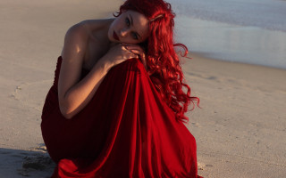Red hair beach woman sitting - daphne mcclure free wallpaper