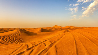 Desert tracks clouds dusk mountain - a desert free wallpaper
