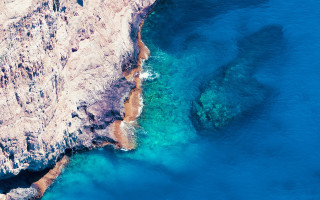 Rocky cliff blue water cherry - a rocky cliff free wallpaper