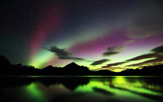 Aurora mountain reflection night stars - over a mountain range free wallpaper