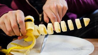 Person cutting banana plate knife - arbeitsrat für kunst free wallpaper