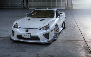 White sports car garage front - a garage free wallpaper