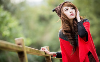 Woman redsweater hat fence lookup - a wooden fence free wallpaper