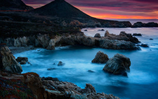 Rocky beach mountain sunset water - mystical free wallpaper
