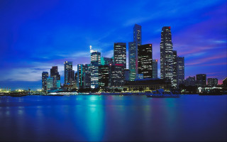 City skyline night boat water 11 - the water and a boat in the foreground free wallpaper