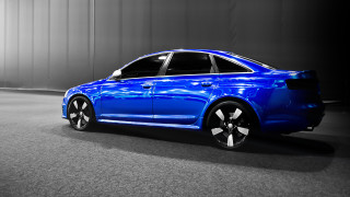 Blue car dark room white 2 - a white wall behind free wallpaper