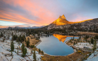Mountain lake sunset clouds bridge - a lake in the middle of it free wallpaper