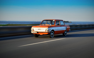 Orange white truck ocean road - retrofuturism free wallpaper