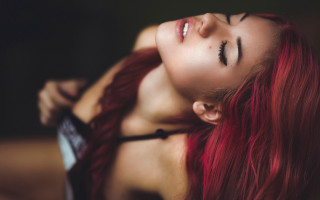 Woman red hair closed eyes - a portrait free wallpaper