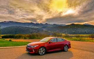 Red car mountain landscape dusk - the side of the road in front free wallpaper