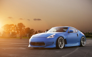 Blue sports car sunset 3d - the sun shining behind free wallpaper