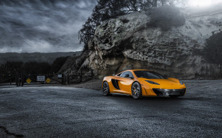 Yellow sports car mountain night - a mountain side free wallpaper