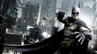 Batman city bat lights cape - his hand and a city in the background free wallpaper