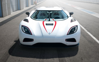 White sports car street building - the front of it free wallpaper