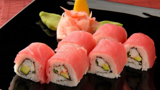 Black plate sushi flower orange - a black plate free wallpaper