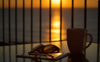 Coffee sunglasses table sunset stilllife - sunrise free wallpaper