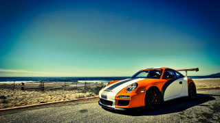 Sports car ocean fence surfboard - a surfboard free wallpaper