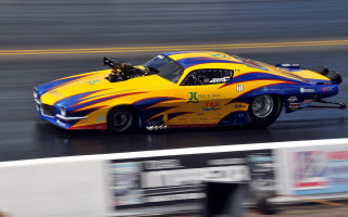 Yellow blue racecar driving person - jimmy nelsson free wallpaper