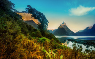 Mountain lake forest sunset outdoor - the foreground and a mountain range in the background free wallpaper