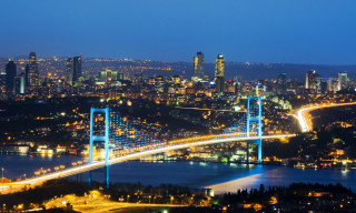 City skyline bridge river night 19 - a city in the background free wallpaper
