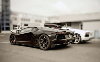 Black sports car parking lot 24 - a parking lot next free wallpaper