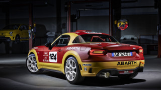 Yellow red sports car garage - a garage free wallpaper