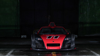 Red sports car parking lot 41 - vorticism free wallpaper
