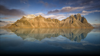 Mountain lake cloudy sky reflections - a cloudy sky above free wallpaper