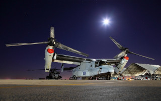Military plane hangar night moon - a large military plane free wallpaper
