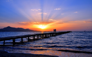 Pier sunset ocean mountain boat - a pier free wallpaper