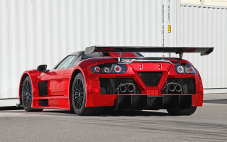 Red sports car white building 2 - hard edge free wallpaper
