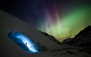 Aurora mountain sky stars fireworks - a cave painting free wallpaper