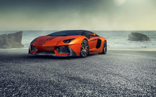 Orange sports car ocean rock - nice free wallpaper