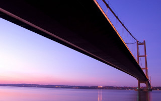 Bridge water city sunset purple - a bridge over a body of water free wallpaper
