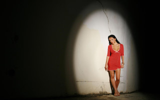 Woman red dress shadow backlighting - a shadow free wallpaper