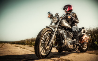 Man riding motorcycle field trees - a road next free wallpaper