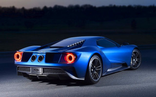 Blue sports car night driving - the rear free wallpaper