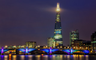 City skyline bridge lit night - a bridge and a building free wallpaper