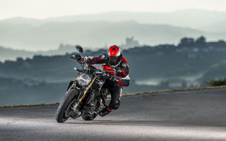 Man motorcycle hillside cloudy day - a road next free wallpaper