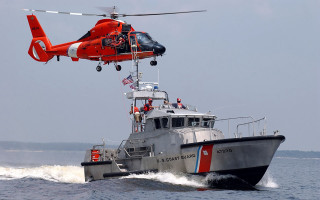 Helicopter flying boat water flag - side and a flag free wallpaper