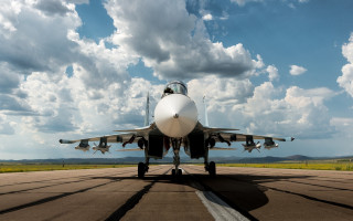Jet plane runway cloudy sky 9 - constructivism free wallpaper