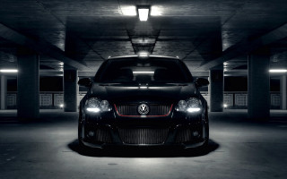 Black car parking garage headlights - a parking garage free wallpaper