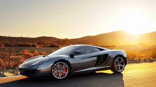Grey sports car mountain road 3 - a road near a mountain range free wallpaper