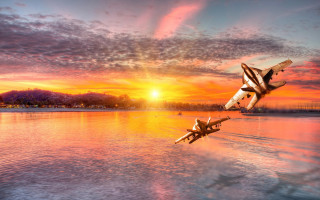 Sunset plane over water matte - over a body of water free wallpaper