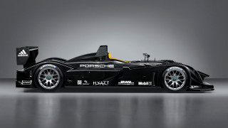 Racecar yellow stripe black background - sharp line free wallpaper