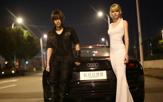 Man woman car night street - a car free wallpaper