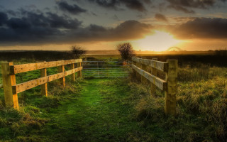 Fence grassfield sunset cloudy sky - bascove free wallpaper for desktop