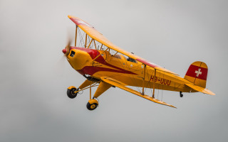 Yellow airplane red cross cloudy - a red cross free wallpaper