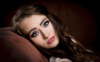 Blue eyes brown jacket portrait - a brown jacket free wallpaper
